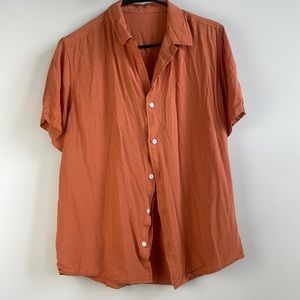 Orange causal button down great for fall spring or summer. Staple piece for sure